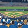 A crowded baseball stadium scene viewed from behind home plate, with a pitcher on the mound, a batter hitting the ball, and fans wearing blue and white jerseys and caps filling the stands.